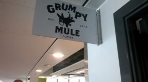 Grumpy Mule coffee sign in the Brindley building 