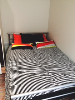Bed in a private shared bedroom
