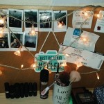 Pinboard with lights and pictures attached