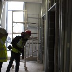 Zach being shown the new lifts that are being installed
