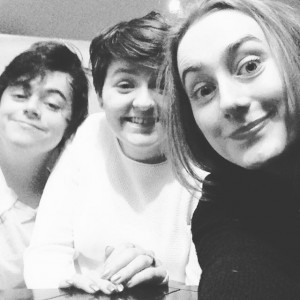 Rebecca with two friends in her kitchen