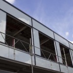 New windows being installed on the Cadman building