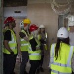 Group being told about the work in the Mellor Building