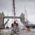 Clipper race boats going through tower bridge